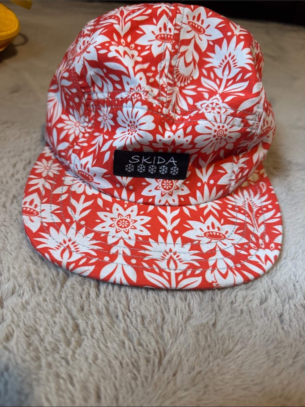 Women’s orange skida Floral Cap